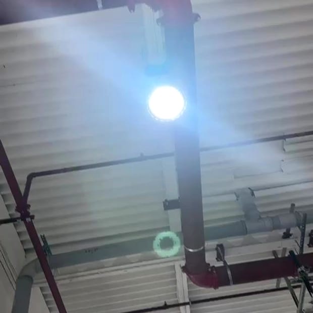 Sprinkler main at roof level in a warehouse